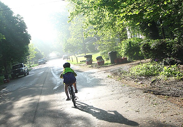Riding off into the sunrise, on the way to school. (Photo by Matt Minde)