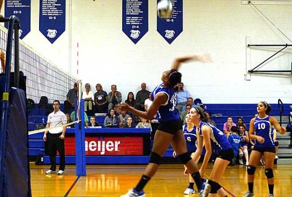 Yellow Springs High School volleyball star Kennedy Harshaw spiked the ball back at Troy Christian at a home match last week. Harshaw led the Bulldogs to a three-set victory with 10 kills and 10 digs on the night. (Photo by Megan Bachman)
