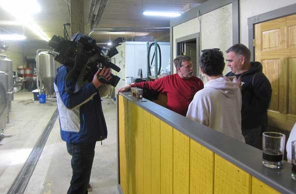 cameraman captures a flight as Yellow Springs' locals chat