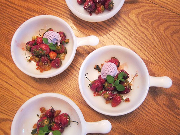 roasted strawberry and rhubarb served with ice cream