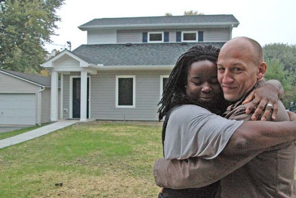 Brett and Isis Henderson will soon close on a house on West Davis Street built by local affordable housing group Home, Inc. The Hendersons hope to raise a family in the three-bedroom house, which was built to use about half the energy of a conventional home. (Photo by Megan Bachman)