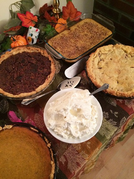pie table with whipped cream