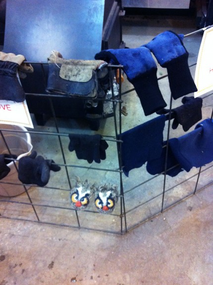 gloves drying by the stove