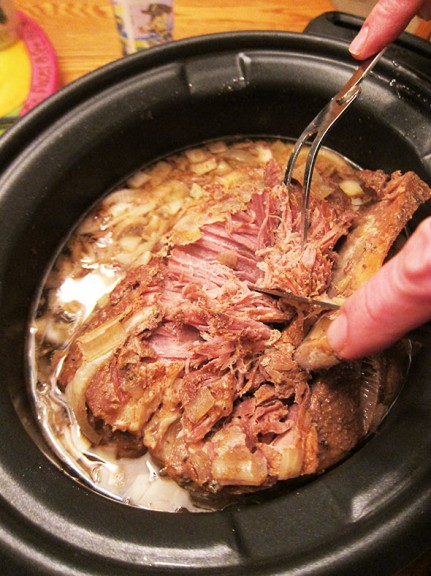 pulling the pork from the bone