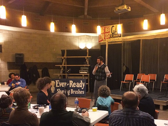 Luke Dennis addresses volunteers