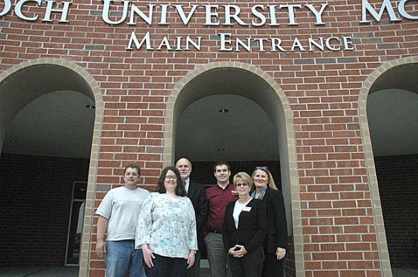 Last Friday Antioch University McGregor students in the Health Services Systems class presented the final installment of a grant to three regional non-profit organizations as part of the statewide Pay-it-Forward program, which teaches Ohio college students to how to be philanthropists. From left to right are McGregor students and representatives of the agencies they selected, including Pat Moeller, student, Elaine England, student, John O’Bryan, Womanline of Dayton, Tim Voltz, Springfield Youth Ministries, Lisa Beair, Pregnancy Resource Center of Springfield and Lori Tuttle, student. 