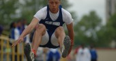 Chris Johnson jumped to fourth place at Tuesday's district track meet