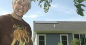 On her roof on Stewart Drive, Pat Brown’s 10 new solar panels convert the sun’s rays into electricity and send it to the Yellow Springs electric grid. She is the first Greene County resident to install grid-tied solar photovoltaic panels. (Photo by Megan Bachman)