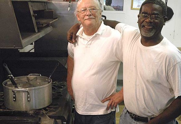 Soon food hounds can get a taste of Yellow Springs’ new restaurant, CJ’s Southern Cooking, located in the building formerly occupied by Kentucky Fried Chicken. Owners Jim Zehner, left, and Carl Moore, both longtime villagers, plan to serve what they call ‘Bama Food, from Moore’s Alabama childhood, including fried bologna sandwiches, gumbos, collard greens and sweet potato pie. They hope to open June 27.