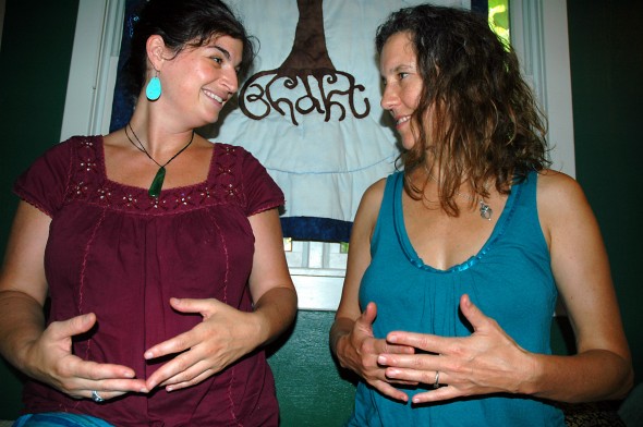 Amy Chavez (left) and Marybeth Wolf of the Yellow Spring Red Tent group shared practices for womb and belly self-massage at the Bhakti house on Herman Street. 
