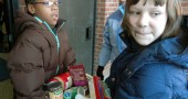 Resse Elam, left, and Aza Hurwitz shuttle food to the Methodist Church pantry