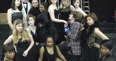 The Yellow Springs High School drama club will open its spring musical, Chicago, this weekend at the Mills Lawn Auditorium, with performances on Friday and Saturday at 8 p.m. and on Sunday at 2 p.m. Senior cast members are, in the back row, from left to right, Liana Rothman, Elliot Cromer, Anne Weigand, Malaika Halley, Lauren Westendorf, Lydia Jewett and Emma Holman-Smith; middle row, Julia Tucheslau, Miranda Russell, Adam Zaremsky and Bella Hernandez; front row, Natasha Perry, Zyna Bakari and Stephanie Scott. (Photo by Megan Bachman)
