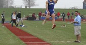 Yellow Springs High School junior Antone Truss soars through the air in the long jump at the rain-shortened Cedarville meet. Truss later won the long jump with a 19’3” leap at Springfield Shawnee. (Submitted Photo by Keturah Fulton)