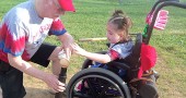 Jimmy Chesire got down in the dirt with t-ball player Mia Campbell at Gaunt Park on Friday, June 17. (Submitted photo)