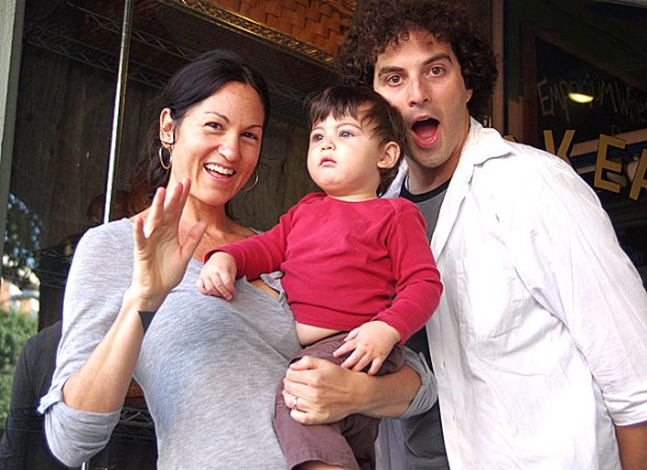 Randi and Joel Levinson, shown with their son, Mortimer, moved to the village from Los Angeles, after discovering Yellow Springs on a visit. Randi is a family therapist and Joel wins online video comedy contests. (Photo by Sehvilla Mann)