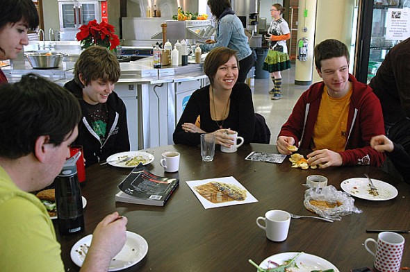 Antioch College students recently ate lunch in their cafeteria, which serves mostly non-processed food increasingly sourced from the campus farm. The Antioch experience so far has been stressful but rewarding, said students, who have to go to class, do homework, work on campus, govern themselves and cook for one another on weekends. At the table are, from left, Eros, Eva Erickson, Jennifer Carlson and Elijah Blanton. (By Megan Bachman)