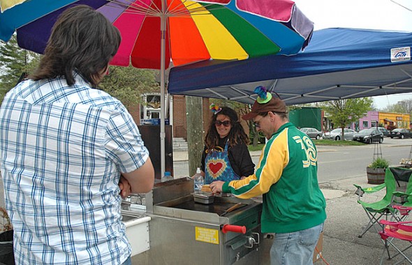 Last week Mindy and Patrick Harney, former owners of Brother Bear’s Coffeehouse, set up their Lot Dogs food cart at the corner of U.S. 68 and Corry Street, in the parking lot of the Dragon Tree. They plan to sell beef, turkey and veggie dogs most days from about 11 a.m. to 4 p.m. Theirs is one of several food carts that have begun appearing downtown. (Photo by Lauren Heaton)