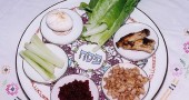 A Passover Seder Plate showing (clockwise, from top): Maror and chazeret — Bitter herbs, symbolizing the bitterness of slavery which the Hebrews endured in Egypt; Z'roa - A roasted lamb or goat shankbone, symbolising the Passover sacrifice; vegetarians often substitute a beet; Charoset — Apple, nut and honey paste representing the mortar used by the Jewish slaves to build the storehouses; Karpas — A vegetable which is dipped into salt water representing tears shed by Hebrew slaves; Beitzah — A hard-boiled egg, symbolizing the festival sacrifice and roasted and eaten as part of the Seder meal. Some Seder plates also include an orange to represent those considered out of place in more conservative Jewish teachings. (Photo from Wikipedia)