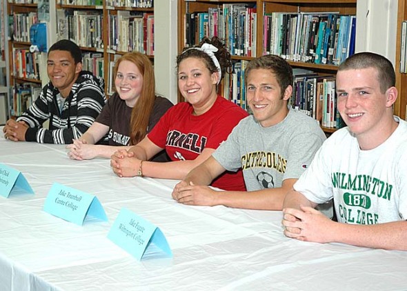 YSHS senior athletes going on to play in college are, from left, Antone Truss (track), Elizabeth Malone (swimming), Erika Chick (swimming), Jacob Trumbull (soccer) and Jake Fugate (football). Not pictured is Greg Felder Jr. (basketball). (Photo by Megan Bachman)