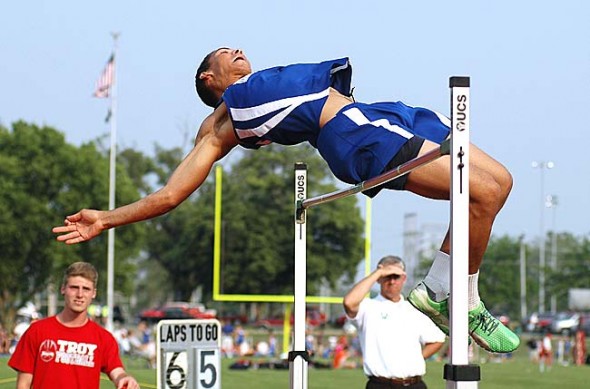 Last weekend Antone Truss became the first YSHS high jumper to qualify for the Ohio High School Division III Track & Field Championships in more than 25 years. The senior seemingly defied gravity during the regional meet as he cleared 6’2’’ to secure his position at states and then conquered heights up to 6’6’’ to finish as the regional runner-up. (Photo by Megan Bachman)