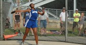 YSHS junior Angela Allen launched the discus 10 feet further than she did at regionals last year, but still came up short of qualifying for the Division III state finals. Allen’s best toss of 102’11” earned her ninth place at regionals. Visit www.ysnews.com for more photos from the meet. (Photo by Megan Bachman)