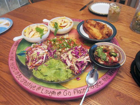 breakfast spread of fish and omelet tacos