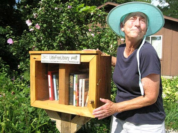Love of reading can now be shared at a neighborhood level using the new tiny library in Moya Shea’s yard at 310 South High Street. The little library operates more like a swap: take a book, leave a book. If the cranberry crate seems too small to serve the whole neighborhood, visit the Little Free Libraries website and learn how to start a library in your front yard. (submitted photo by Susan Gartner)