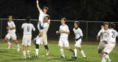 Nathan Miller celebrated his game-winning goal with teammates during the Bulldogs 2–1 come-from-behind victory over visiting Madison in last Thursday’s district opener. Miller scored on a header with less than three minutes left in the game. From left are Grant Reigelsperger, Levi Perry, Miller, Roland Newsome, Fielding Lewis, Gabe Rehm, Ian Chick and Jared Scarfpin. (Photo by Megan Bachman)