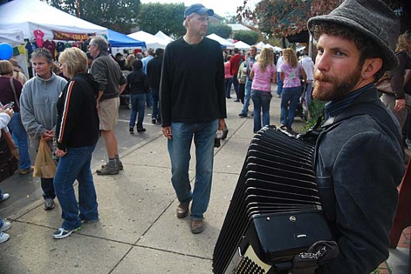 Ben Hemmendinger busks with accordion at 2012 Fall Street Fair (photo by Aaron Zaremsky)