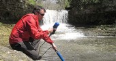 In its first year as a division of Xylem, YSI launched Exo, a new line of advanced water quality monitoring sonde systems. Here Rob Ellison, Director of Research and Development at YSI, tests an Exo sonde along Birch Creek in the Glen Helen Nature Preserve. YSI has continued double-digit growth since being acquired last year. (Submitted photo courtesy of Xylem)