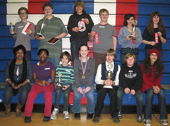 McKinney Middle School students took home an impressive array of awards at the annual Power of the Pen writing competition on Saturday, Feb. 2. Pictured from left to right in the back are: Duard Headley, Baer Wright, Jack Lewis, Windom Mesure, Lorien Chavez and Evening Hudson. Pictured in the front row from left to right are: Ms. Aurelia Blake, Evalynn Orme, Aidan Hackett, Greta Kremer, Peter Day, Cameron Knopp and Solene Roullier. (Submitted photo)