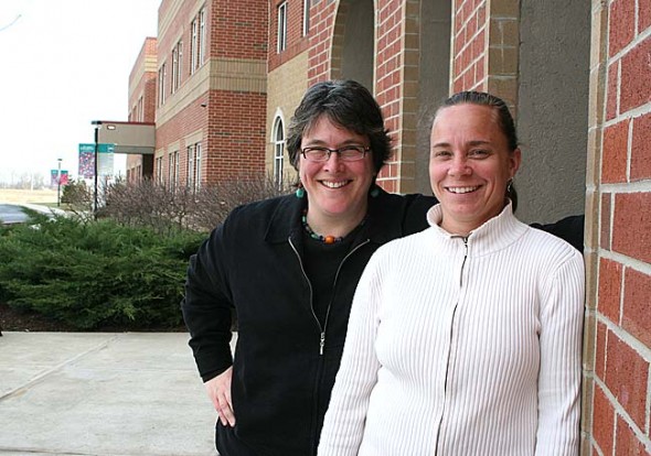 Jennifer Berman, left, of Antioch College and Sarah Wallis of Antioch University Midwest are co-organizers of the upcoming education conference, “Safe School Climate: Making the Invisible Visible.” The event features internationally-known educator Kim John Payne. Photo by Suzanne Szempruch