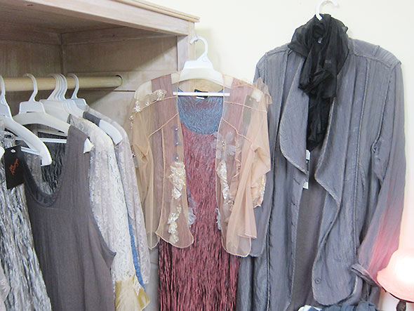 gray duster among other items at Julia Etta's Trunk