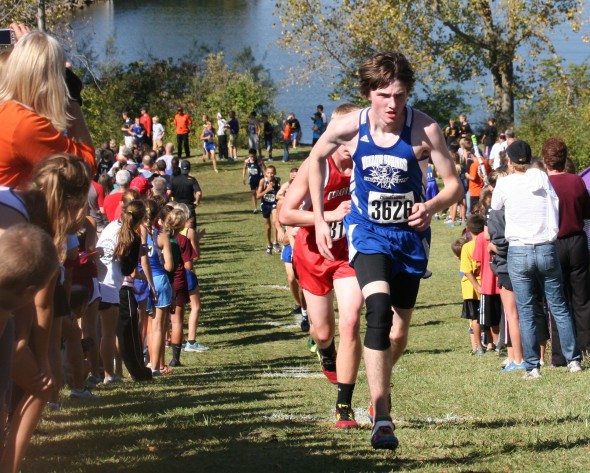  YSHS senior Carter Collins attacked the final hill at the Buck Creek Invitational cross-country meet on Saturday. Carter ran a lifetime best of 20:29 for the 5 kilometer high school distance. (Photo by Olivia Brintlinger-Conn)