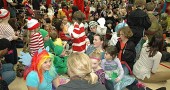 Bursts of color and activity filled the Mills Lawn School gymnasium as kids cavorted in costumes. (Photos by Matt Minde)