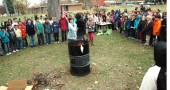 Many Mills Lawn School students, teachers and veterans participated this Veterans Day in a flag retirement ceremony, wherein a flag too damaged to fly as a fitting emblem is burned. (Photos and video by Matt Minde)
