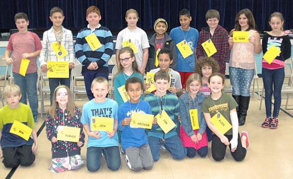 The 2013 Mills Lawn School Spelling Bee participants lined up for a group shot after the event. (Photos by Matt Minde)