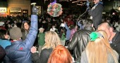 A huge crowd of people packed Short Street and Xenia Ave. to bring in the New Year. Though the countdown was not exactly audible, the enthusiasm ramped up at midnight. (Photo by Suzanne Szempruch)