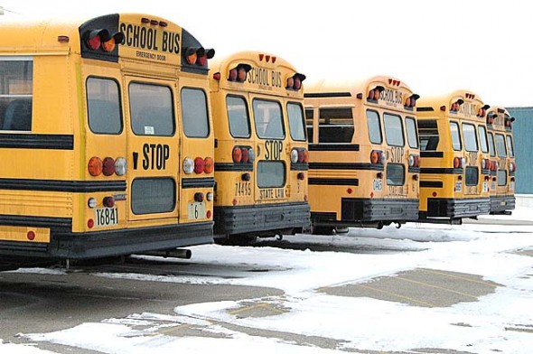 School buses sit idle during the single-digit temperatures of the previous weeks. (Photo by Megan Bachman)