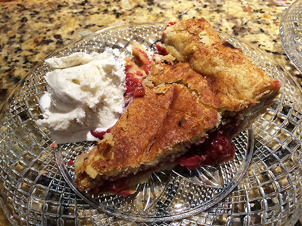 a slice of strawberry rhubarb pie