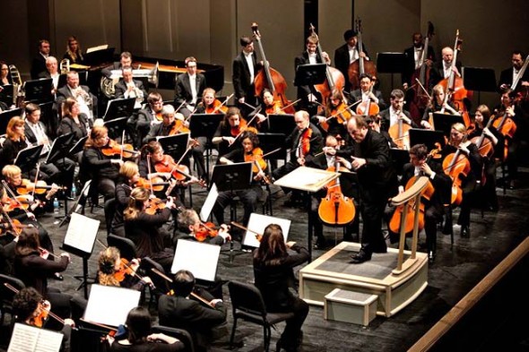 Villagers may ride a bus to a series of six concerts of the Springfield Symphony Orchestra, shown above directed by Peter Stafford Wilson, with Yellow Springs resident Paul Van Ausdal on viola, rear.