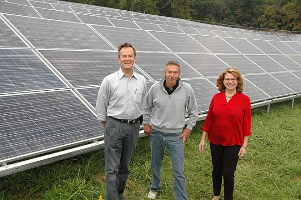 Antioch College personnel, solar project finance advisor Doug Hull, Physical Plant Director Reggie Strattion and Andi Adkins, VP of administration and finance, invite the public to tour the new campus solar array. 