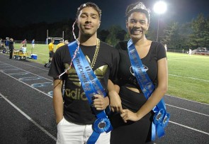 Edward Johnson and Mar’ria Miley celebrated as Yellow Springs High School’s 2014 Homecoming King and Queen at Fridays night’s boys soccer game. (Photos by Megan Bachman)