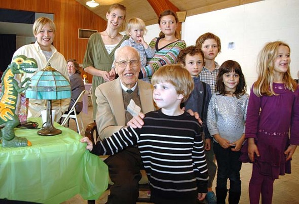 Among those celebrating Lloyd Kennedy’s 100th birthday last Sunday at the First Presbyterian Church were, in front, Kennedy, Liam Magnus, Mike Trelawny-Cassity, Anaya Adoff and Zan Magnus; in back, from left, Sven Meister, Jane Meister, Kate Meister and Tyler Linkhart. (photo by Carol Simmons)