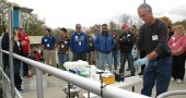 Jon Van Dommelen of the Ohio EPA giving a demonstration at the Yellow Springs wastewater plant on how to troubleshoot nitrification and denitrification with online nitrate and ammonium sensors. (photo by Diane Chiddister)