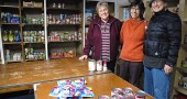 The Yellow Springs Food Pantry, located in the basement of the United Methodist Church, seeks donations for the holiday season. This month the pantry will be open the second Thursday, Dec. 11, and the fourth Tuesday, Dec. 23, from 2 to 4 p.m. Longtime director of the pantry Patty McAllister, left, will step down as director and Paula Hurwitz, center, will take over the first of the year, although McAllister will continue to volunteer at the pantry. Ruth Paige, right, will serve as coordinator of volunteers. (Photo by Diane Chiddister)