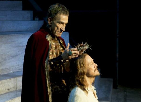 Barry Denned, as Pilate, places the crown of thorns on the head of Ted Neeley, as Jesus in a stage revival of "Jesus Christ Superstar." Both Dennen and Neeley will be in Yellow Springs March 27–29 for screenings of the film and Q&A at the Little Art.