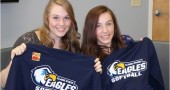 YSHS seniors Jesi Worsham (left) and Chelsea Horton hold up their team shirts after signing to play softball for the 2016 season at Clark State Community College. (Submitted photo)