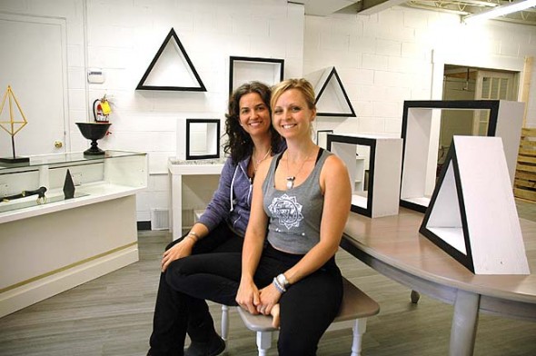 This week Stephanie Gooch, left, and Melissa Herzog open House of AUM, a mind-body business offering daily yoga classes, monthly weekend yoga retreats and a retail shop with vintage, upcycled and fair trade jewelry, clothing and home goods. House of AUM is at 125 S. Walnut St. in the rear of Kings Yard, formerly the site of Atomic Fox and the Tie Dyed Gift Shop. (Photo by Megan Bachman)