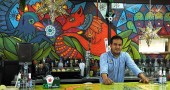 Professional restauranteur Tony Avalos poses behind the bar at Doña Margarota’s, a Mexican restaurant that opened last week on Xenia Avenue. The menu is inspired by his grandmother’s cooking, he said, and the decor draws influence from whimsical Mexican folk art. Patrons especially appreciated the giant margaritas. (Photo by Dylan Taylor-Lehman)